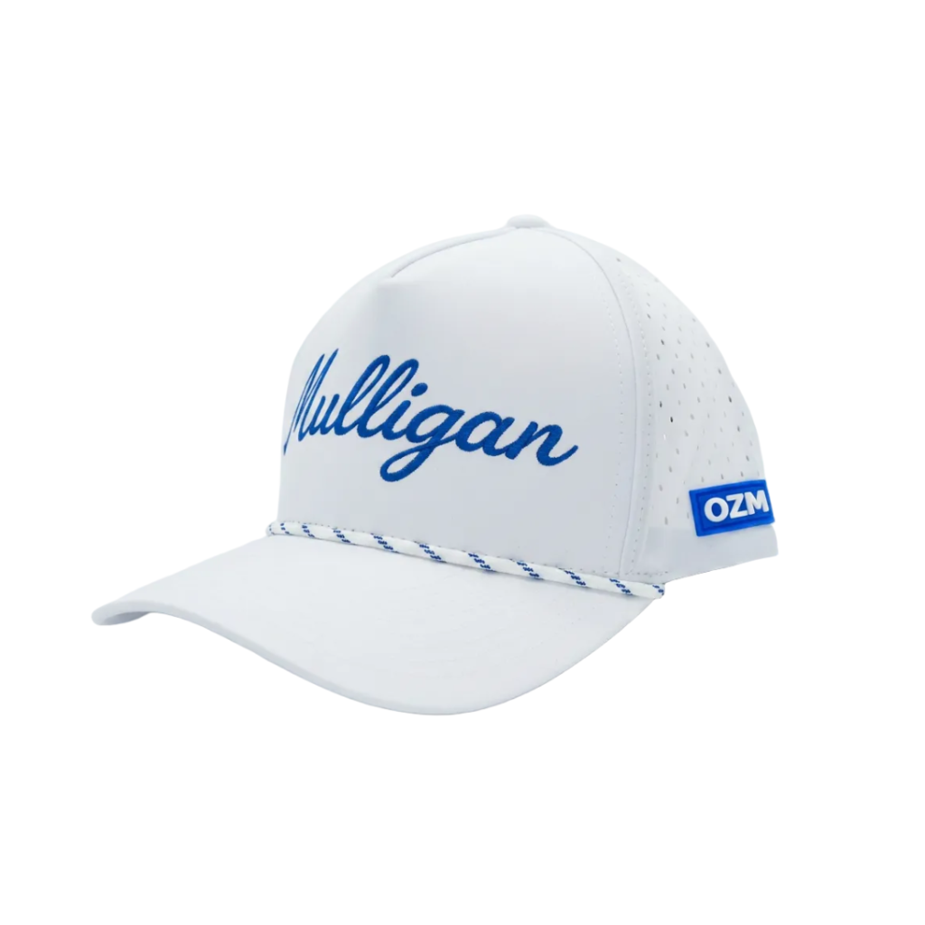 A white golf cap with blue embroidered script reading 'Mulligan' on the front, perforated side panels, a blue-and-white braided trim under the brim, and a blue 'OZM' patch on the side, photographed on a clean white studio background.