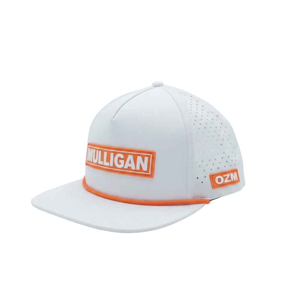 A white structured baseball cap with a flat brim, featuring an orange-bordered 'MULLIGAN' patch on the front, a perforated back panel, and an orange-bordered 'OZM' patch on the side.